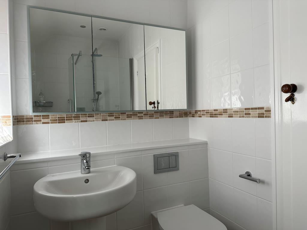 Lot: 149 - THREE-BEDROOM SEMI-DETACHED HOUSE - Bathroom with Shower, WC and basin